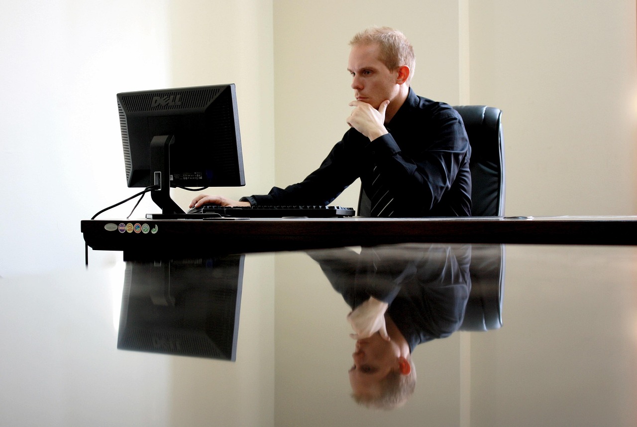 Business, businessman, chair — Business Funding for 3 Million or More: How will my business be evaluated?