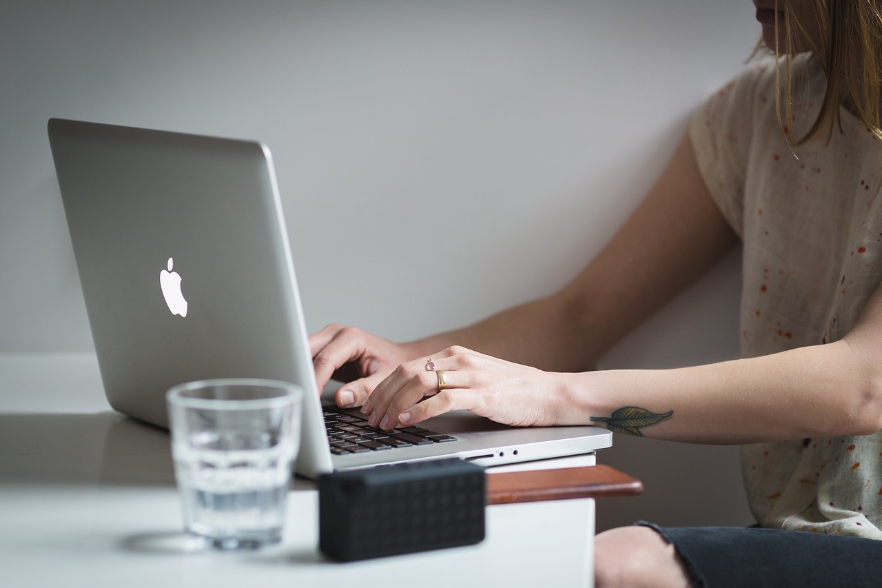Laptop, apple, macbook — Stay close to god by attending regular Sunday mass