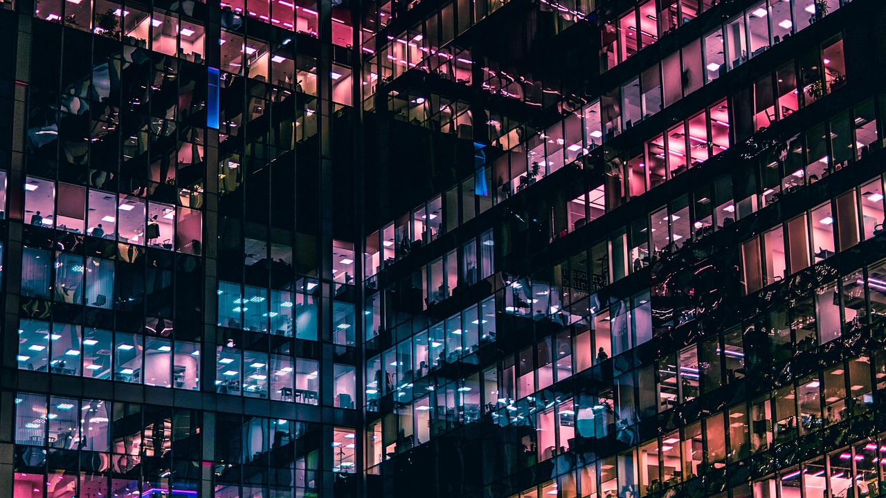 City, window, architecture — What are the advantages and disadvantages of payroll outsourcing?